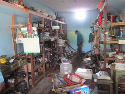 A local small-business owner in his work area