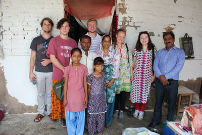 Students meet with local migrant family, 2015