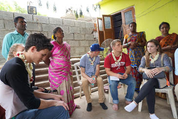 Students talk with local religious community