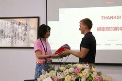 Student Presenting Artop Group in Shenzhen a Gift