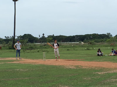 Students learn to play cricket